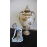 A Lladro figure of a girl picking flowers and large vase with cover