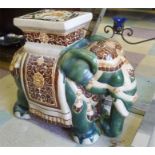 A large pottery elephant plant stand