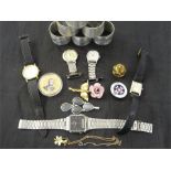 A collection of various watches, serviette rings etc.