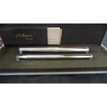 A 925 silver Dupont writing set, comprising of Fountain pen ( 18ct white gold nib) and a ball