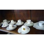 A quantity of various Devon crested china cups and saucers including Ottery St Mary, Sidmouth, and 1