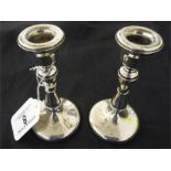 A pair of silver candle sticks