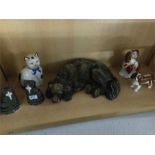 A quantity of various cat and dog ornaments including Staffordshire