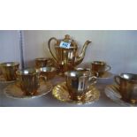 A Wade gold plated part coffee set