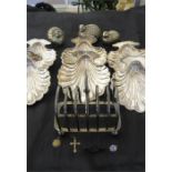 A silver plated toast rack, Elkington shell dishes, quail condiment set and a small quantity of