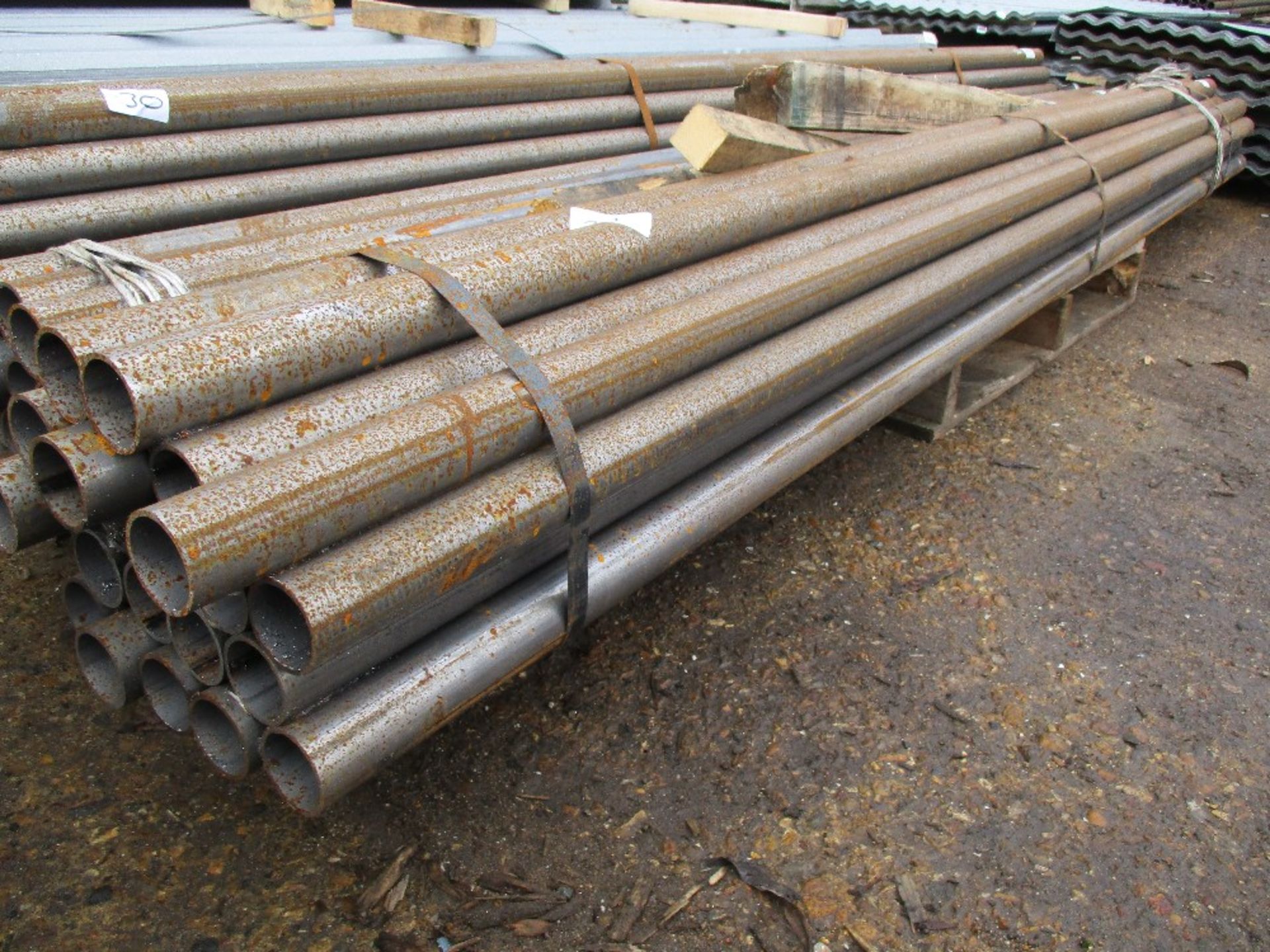 2x bundles of 27no. approx (54 total). steel tubes 2.94m length approx.