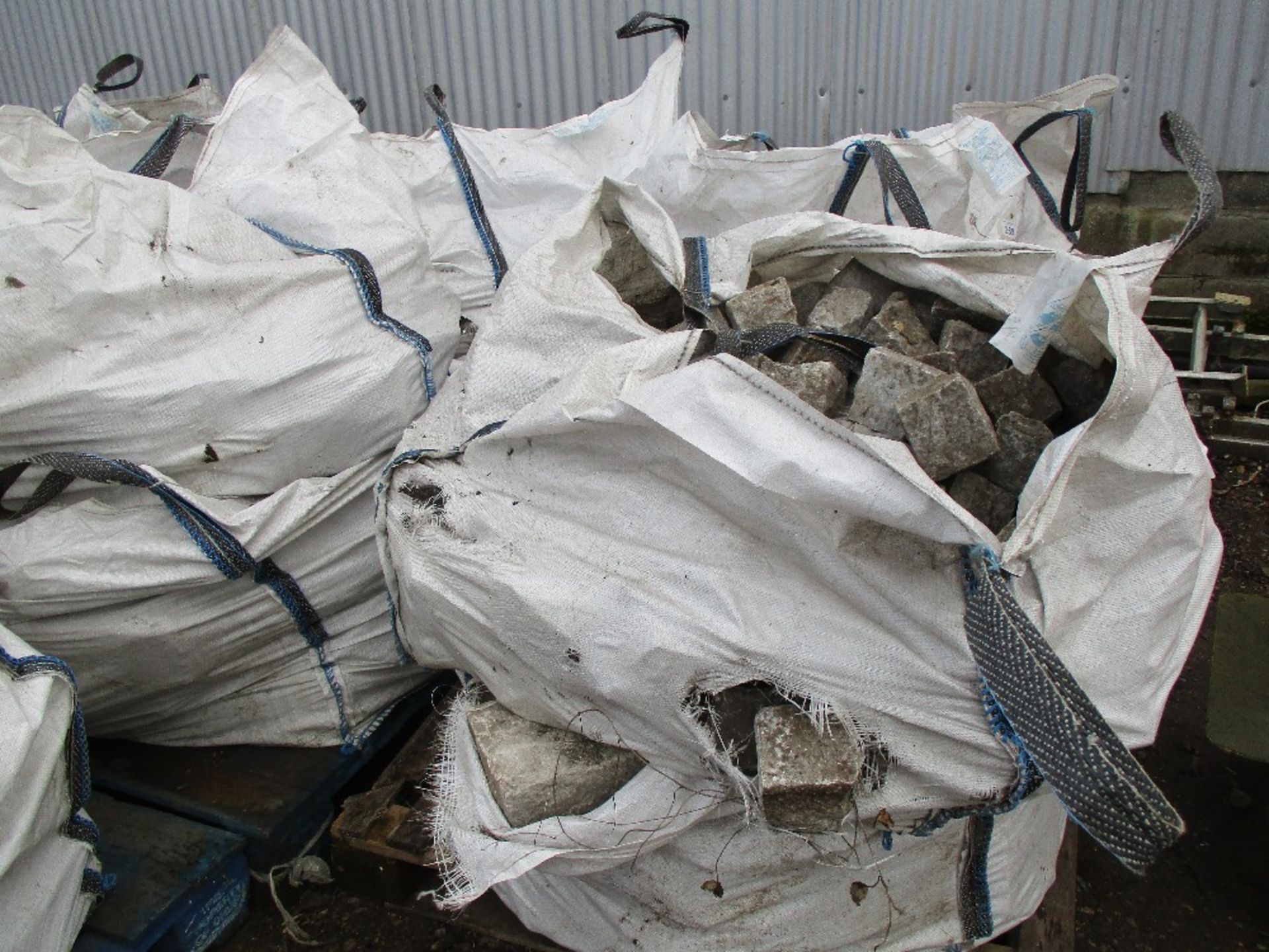 8NO. Bulk bags of granite kerbs/rockery stones