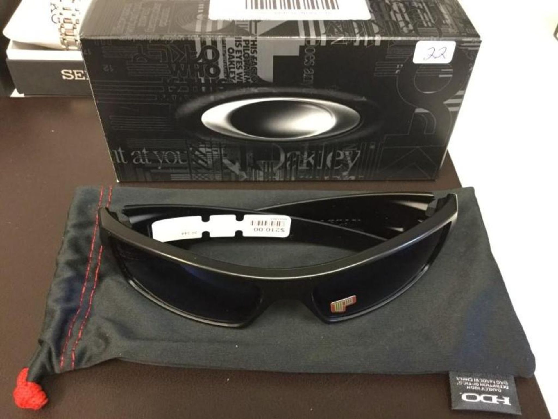 NEW Oakley Designer Sunglasses retail $220 - Image 2 of 2