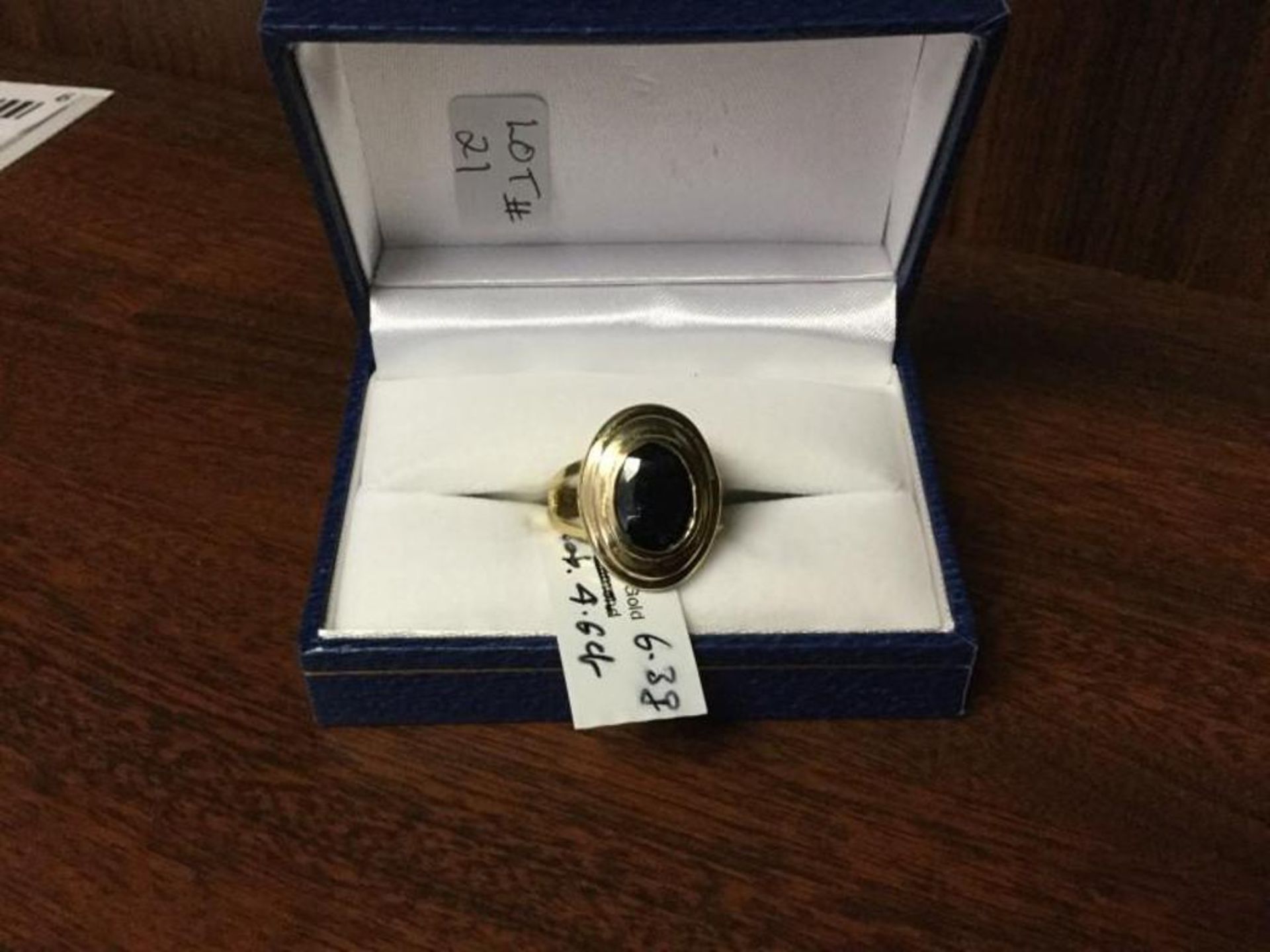 Ladies ring, Yellow Gold with blue gemstone value -$5400