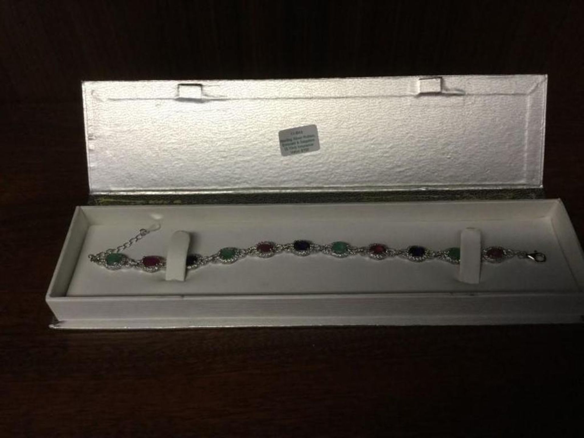 Sterling Silver bracelet with Rubies, emeralds, and sapphires value $700 - Image 3 of 4