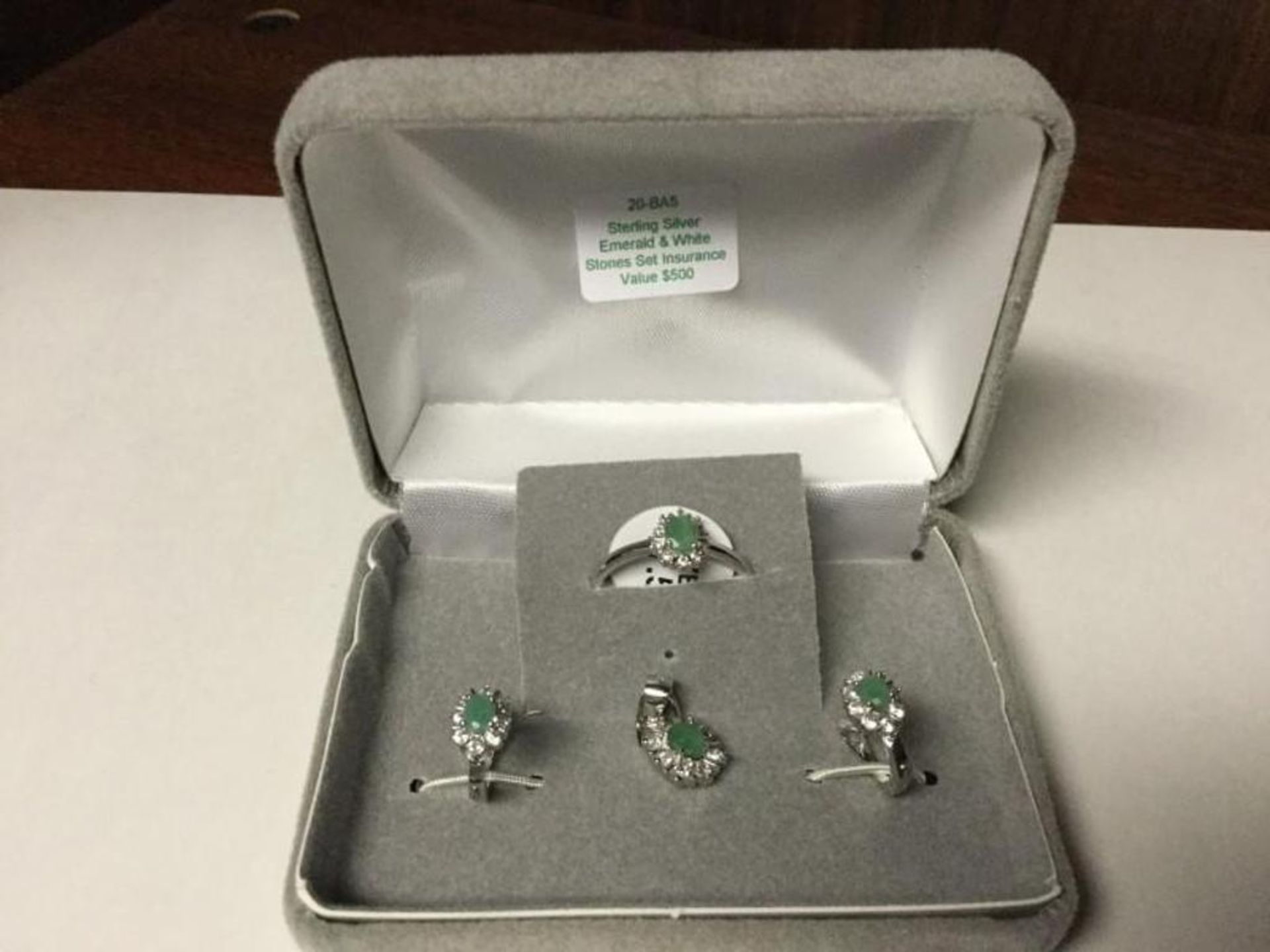 Ladies Sterling Silver and Natural emerald set of ring, earrings, and pendant Value $ 500