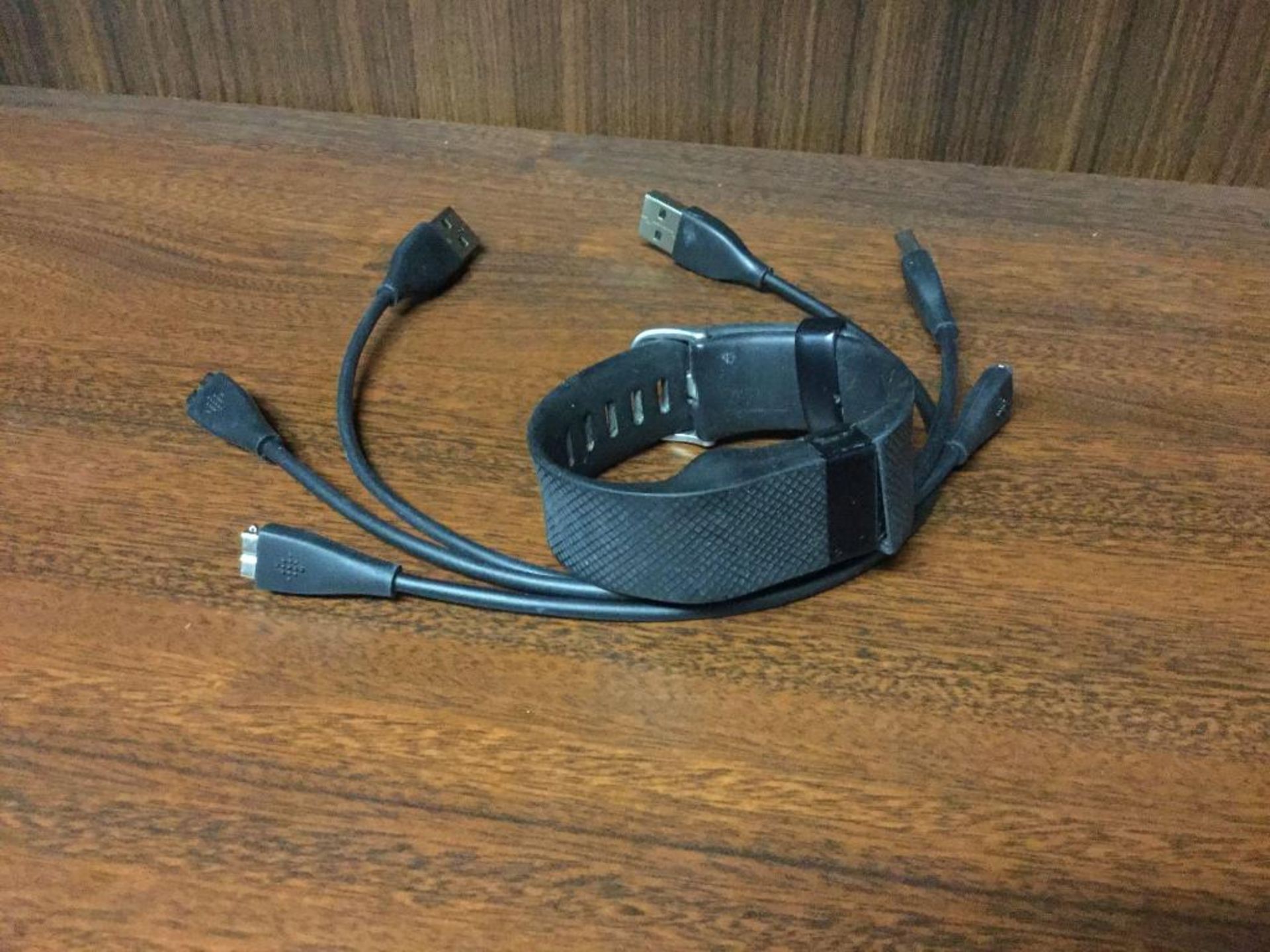 Fitbit with charging cords