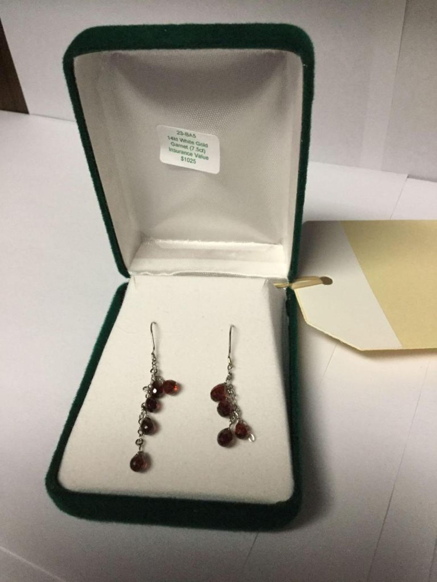 Garnet drop earrings set in 14kt white gold - Value $1025