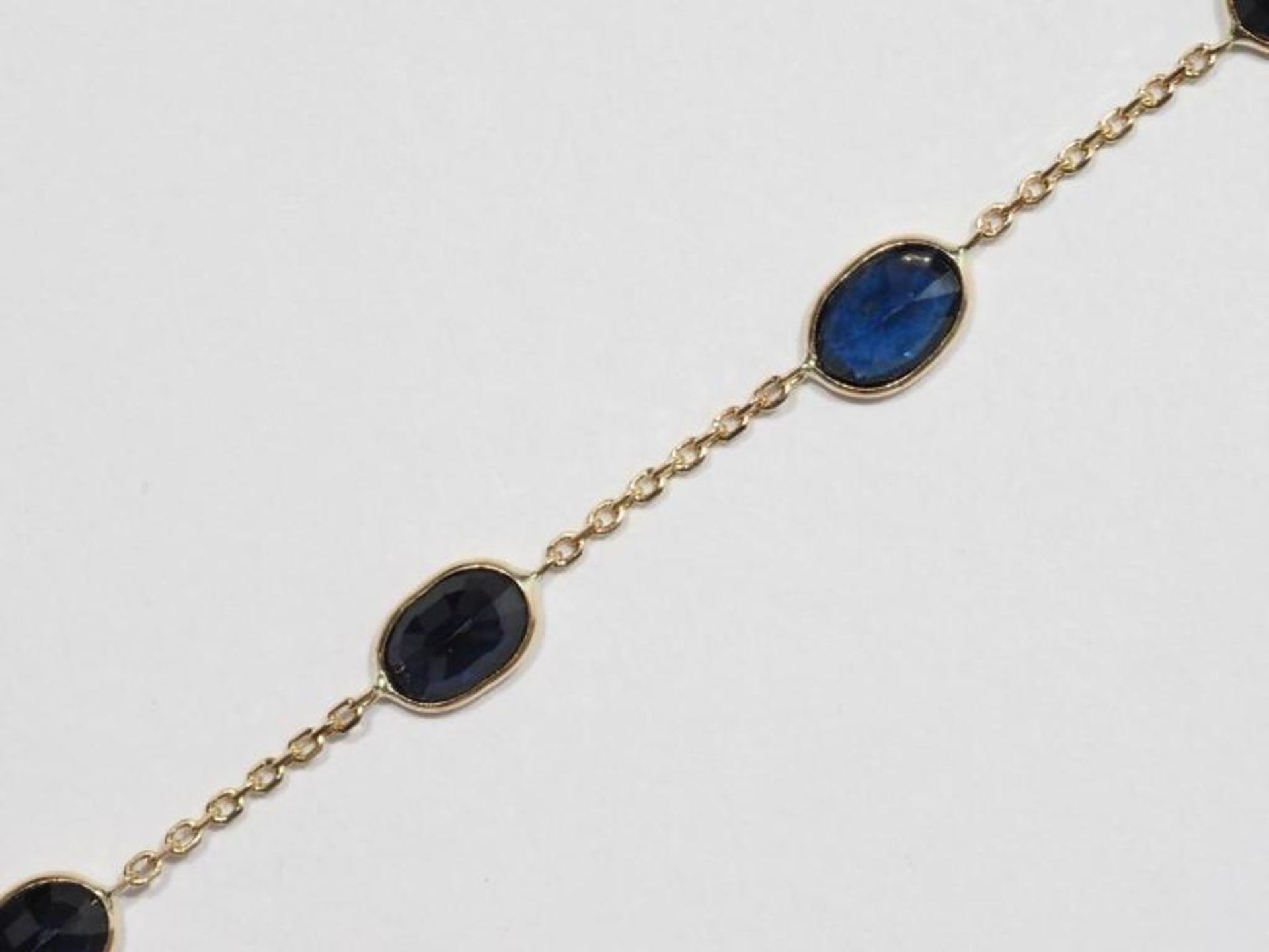 14K Yellow Gold 9 Sapphire (5.0ct) Bracelet. Insurance Value $1800