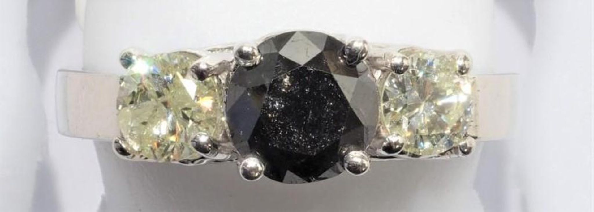 14K White Gold Black Diamond (1.04ct) with two White Diamonds (0.50ct) Ring. Insurance Value $6660