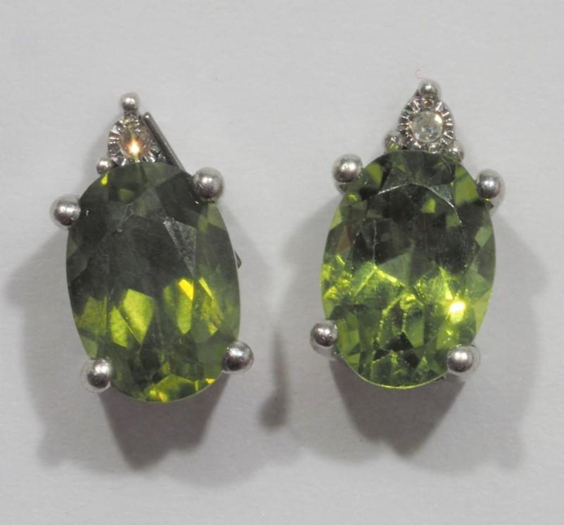 Sterling Silver Peridot (1.8ct) and Diamond Earrings Retail $600