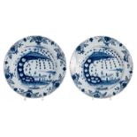 A pair of 18thC tin glazed and bleu decorated Dutch Delftware plates, (the usual glaze flaking to