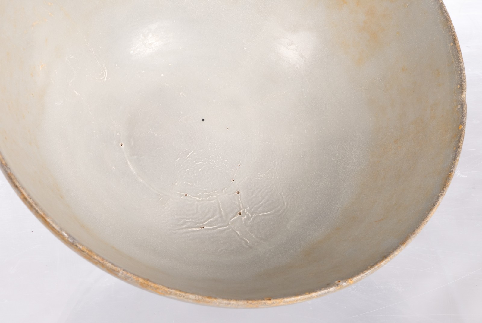 A Chinese celadon stoneware bowl, H 9,5 cm - Diameter 19,5 cm (chips, cracks and firing faults to - Image 9 of 10
