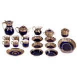 Various parts of a soft paste coffee and tea service, enamel and gilt decoration on a 'bleu nouveau'