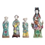 Three Chinese polychrome figures, one figure on a matching wooden base, 18th and 19thC, (damage);