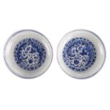 Two Chinese blue and white dishes, decorated with a dragon and a flaming pearl, marked Qianlong, H 4