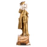 Joanny R., 'Coquetterie matinale', bronze, ivory on an onyx marble base, early 20thC, H 28 cm