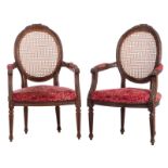 A pair of LXVI style armchairs 'à medaillon', H 110 cm