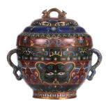 A Chinese cloisonné pot and cover, decorated with auspicious symbols and geometric and stylized