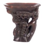 A Chinese carved horn libation cup, 19thC, H 14 cm