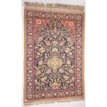 An Oriental rug, 108 x 160 cm