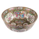 A Chinese Canton famille rose decorated bowl, the roundels with court scenes and birds on flower