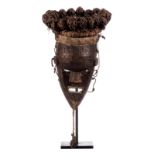 An African etnographic mask on an iron base, H 51,5 cm