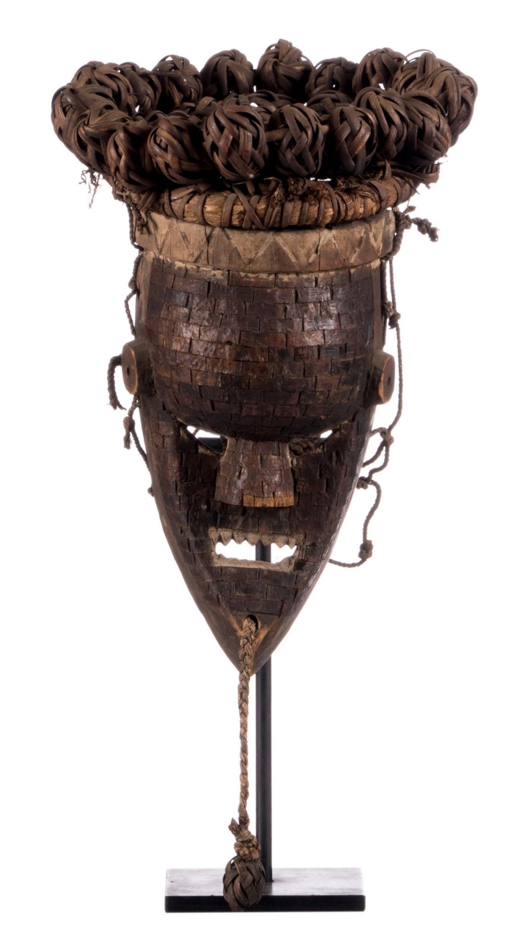 An African etnographic mask on an iron base, H 51,5 cm