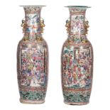 A pair of impressive Chinese famille rose vases, relief decorated with dragons and phoenix, the