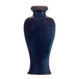 A Chinese flambé-glazed baluster shaped vase, H 23,5 cm (chips)