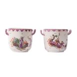 A pair of polychrome decorated soft past jardinieres, the decoration in the manner of Höroldt with