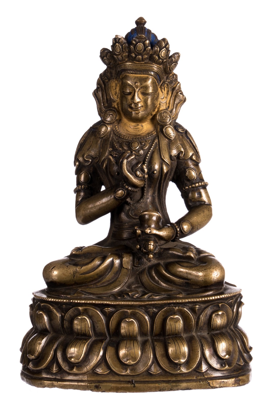 A Sino-Tibetan bronze seated Buddha with traces of gilt and polychromy, H 15 cm