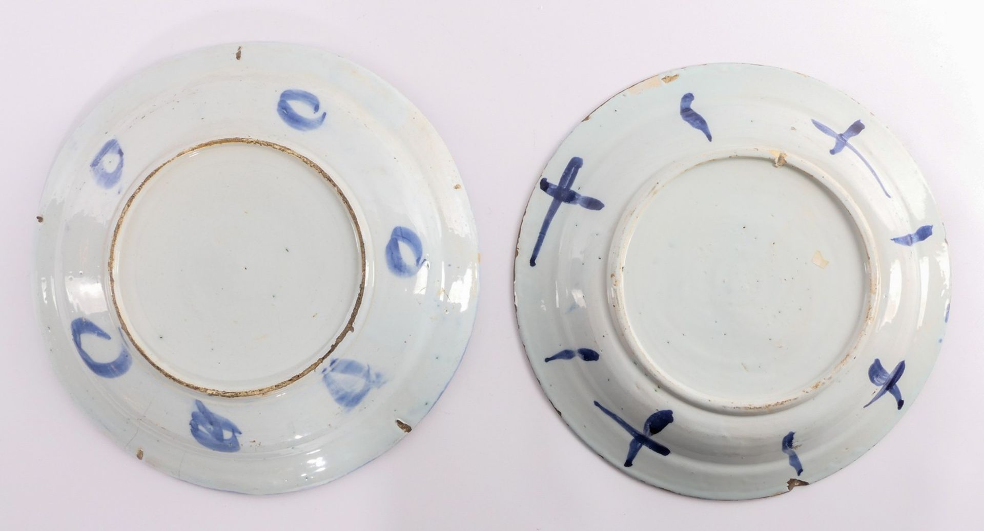 Two tin glazed and blue Wanli decorated Dutch Delftware plates, 17thC, (the usual glaze flaking to - Image 2 of 6
