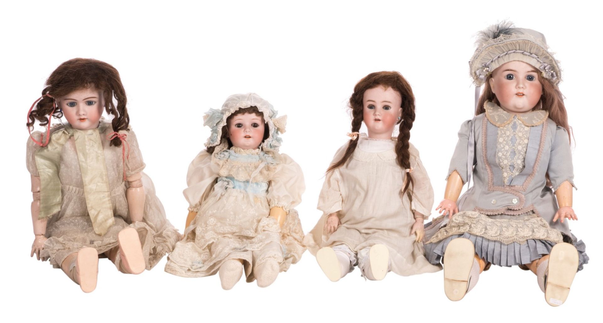 Four dolls: Simon & Halbig n° 99, size 16, about 1900; Majestie n° 17, German, about 1900, Simon &