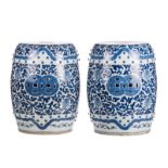 A pair of Chinese blue and white garden seats with auspicious symbols, H 48 cm