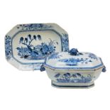 A Chinese octagonal blue and white tureen on a matching plate, decorated with several flower