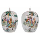 Two Chinese polychrome ginger jars and covers, decorated with an animated scene, H 30,5 cm (chips to