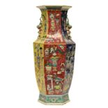 A Chinese polychrome ground famille rose hexagonal vase, decorated with antiquities, H 57,5 cm (