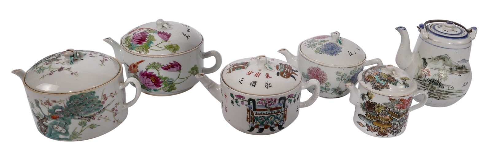 Six Chinese polychrome teapots and covers, decorated with flower branches, antiquities and a