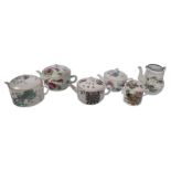 Six Chinese polychrome teapots and covers, decorated with flower branches, antiquities and a