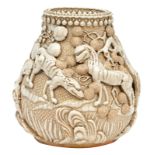 A Chinese relief moulded stoneware vase, decorated with animals and flower branches, marked, about