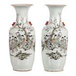 A pair of Chinese famille rose vases, polychrome decorated with a gallant garden scene, signed, H