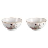 A pair of Chinese famille rose cups decorated with figures and calligraphic texts, signed and