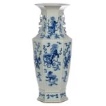 A hexagonal Chinese celadon ground blue and white vase, decorated with Fû-lions, 19thC, H 60,5 cm