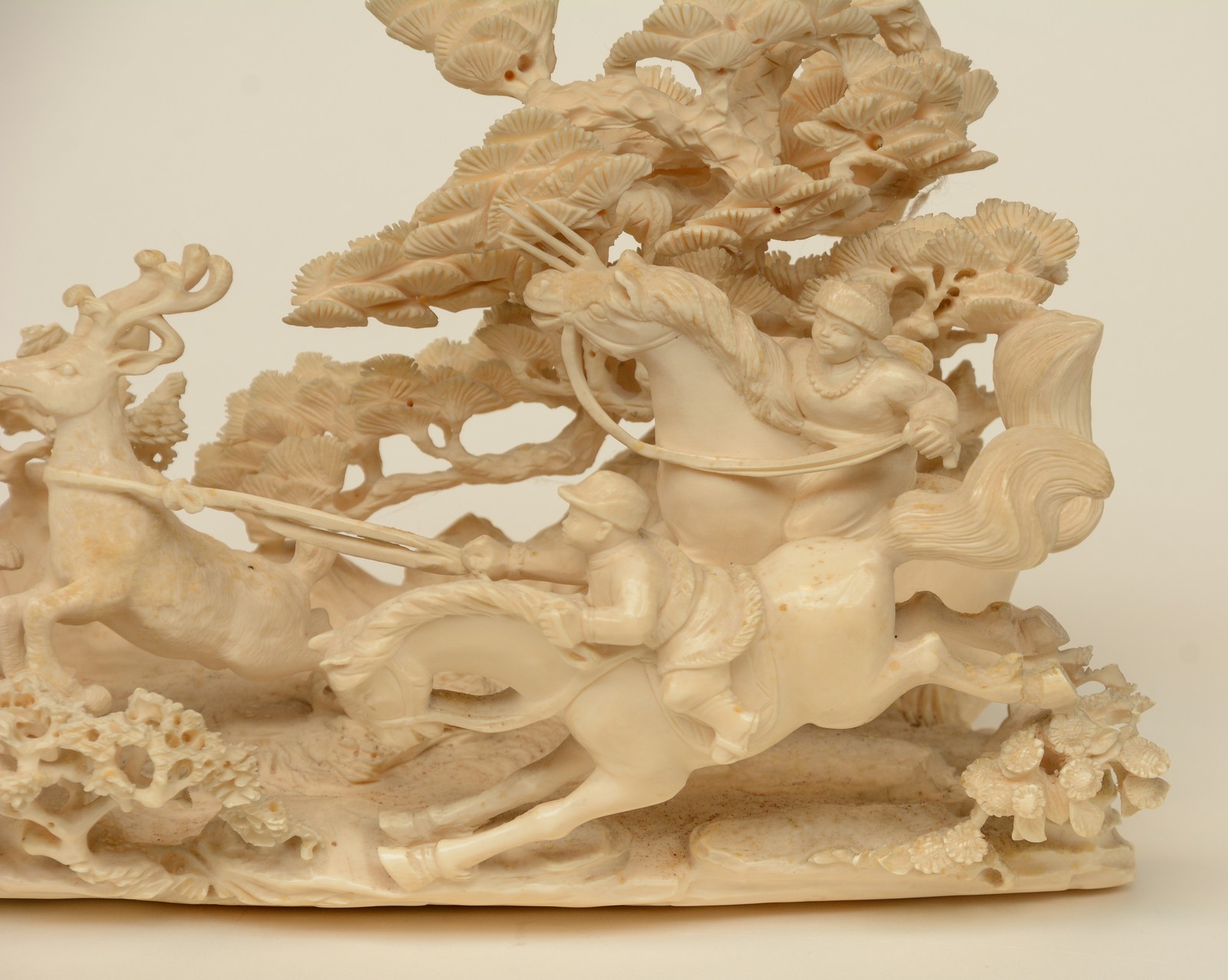 A Chinese ivory group depicting 'young heroes hunting for reindeers' on a carved wooden base, - Image 6 of 9
